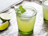 Easy Limeade in a glass with a mint sprig