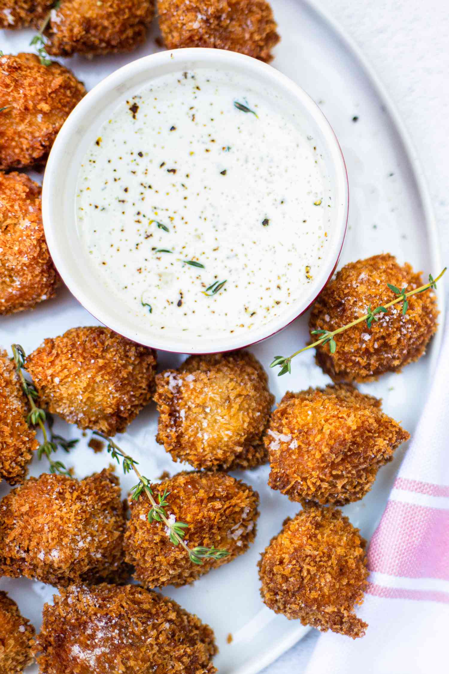 Fried Mushrooms Served with a Bowl of Dipping Sauce