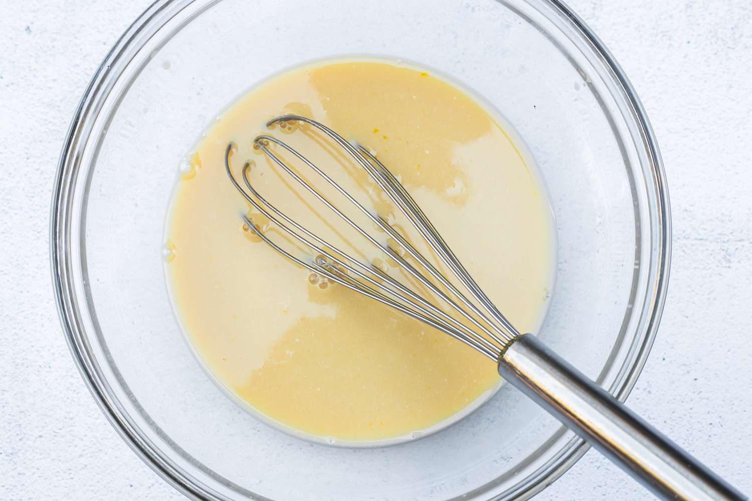 Bowl of Beer, Buttermilk, and Eggs Whisked Together for Fried Mushrooms Recipe