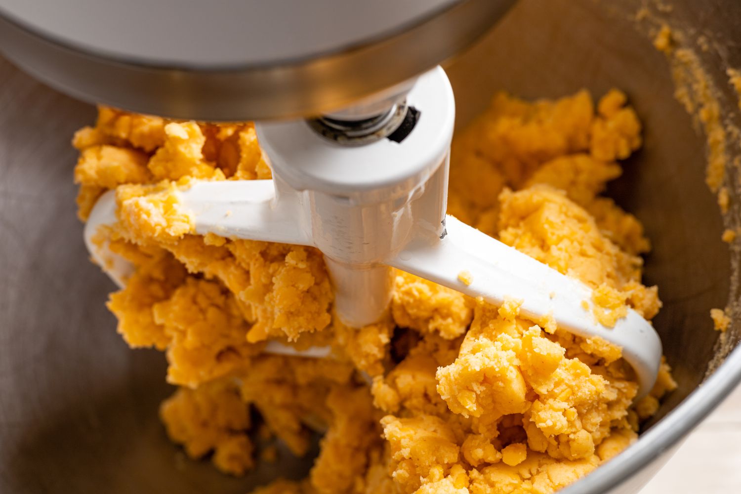 Cheese Straws Mixed Together in a Stand Mixer