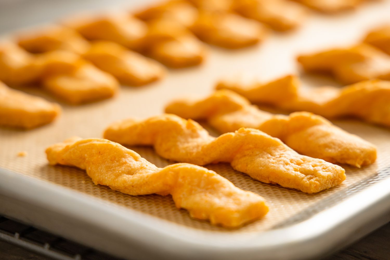 Cheese Sticks on a Lined Baking Sheet