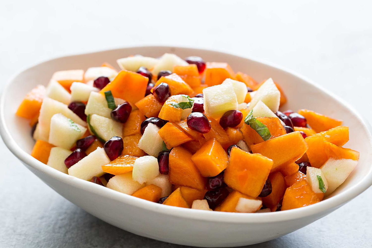 Salade de fruits au kaki et à la grenade