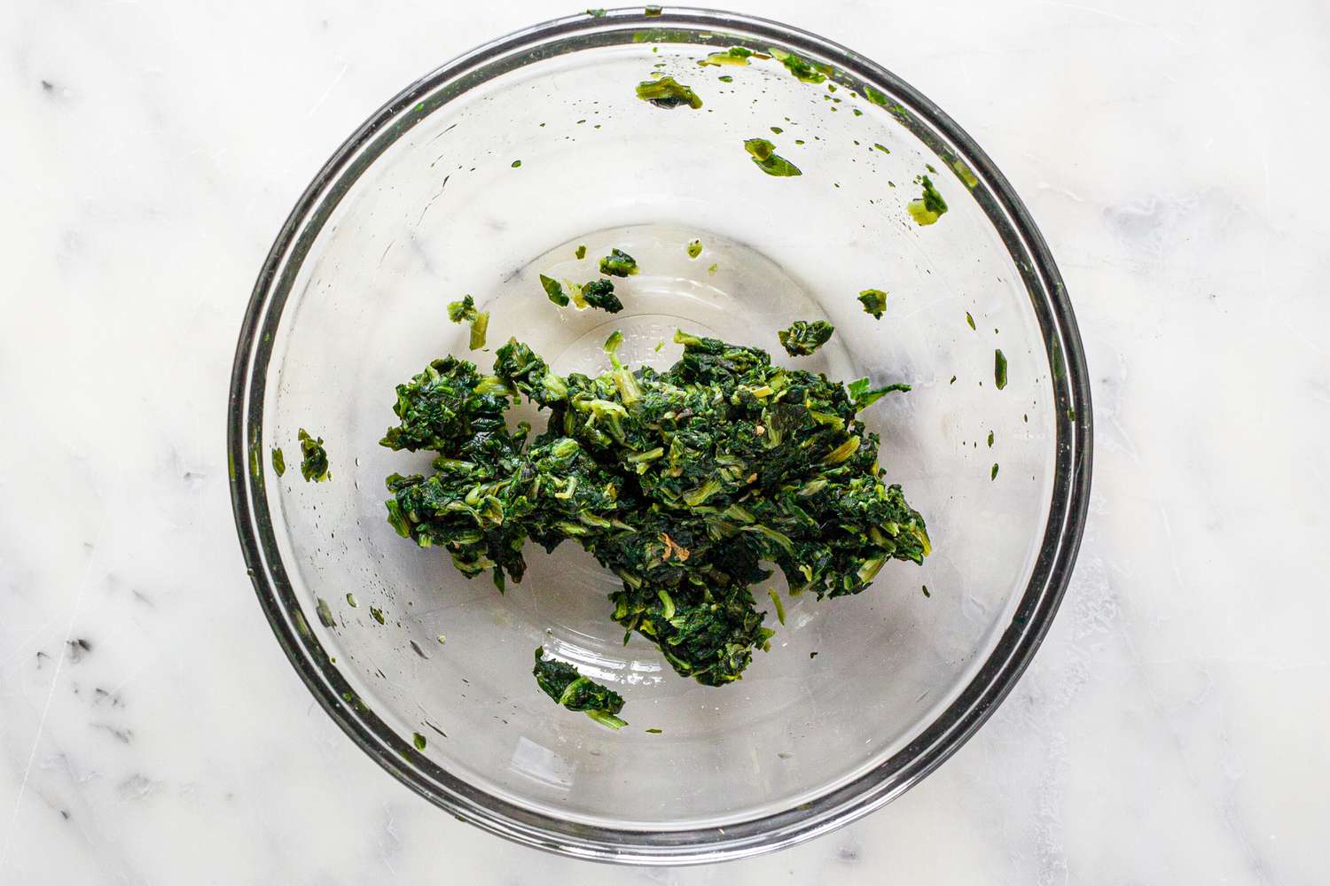 Moisture Squeezed from Defrosted Spinach for Easy Spinach Dip Recipe