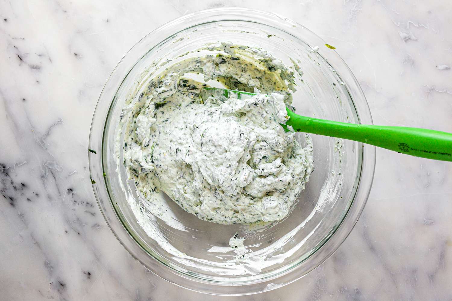 All Spinach Dip Ingredients Mixed Together in a Bowl