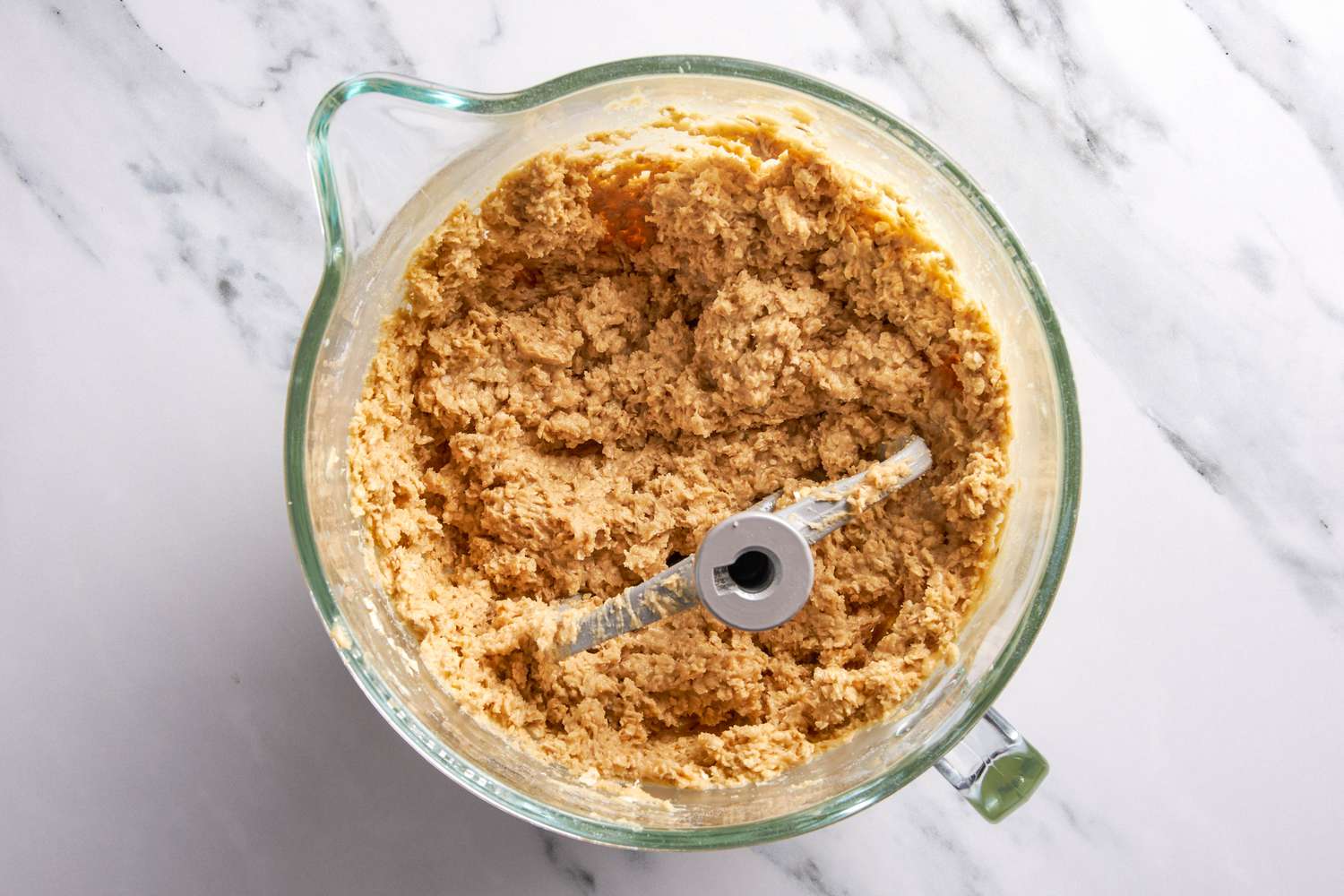 Oats mixed into to the yellowhammer cookie dough using a flat beater attachment