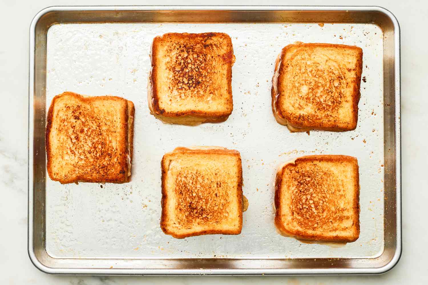 Golden-Brown Sheet Pan Grilled Cheese Sandwiches After Another Round in the Oven