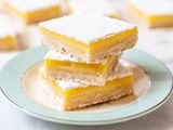 Lemon Bars Recipe - lemon bars on blue plate