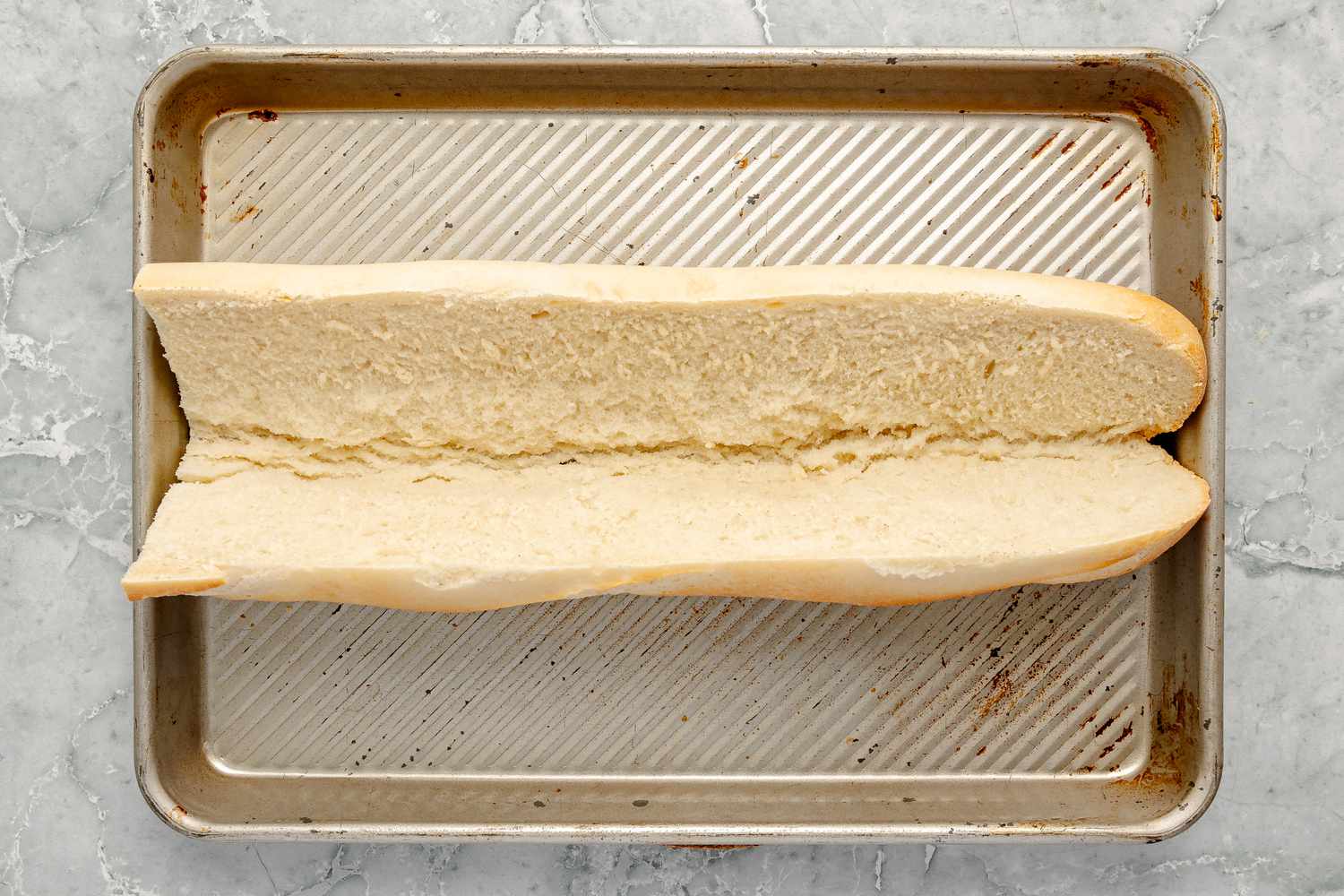 Baguette on Baking Sheet for Bánh Mì