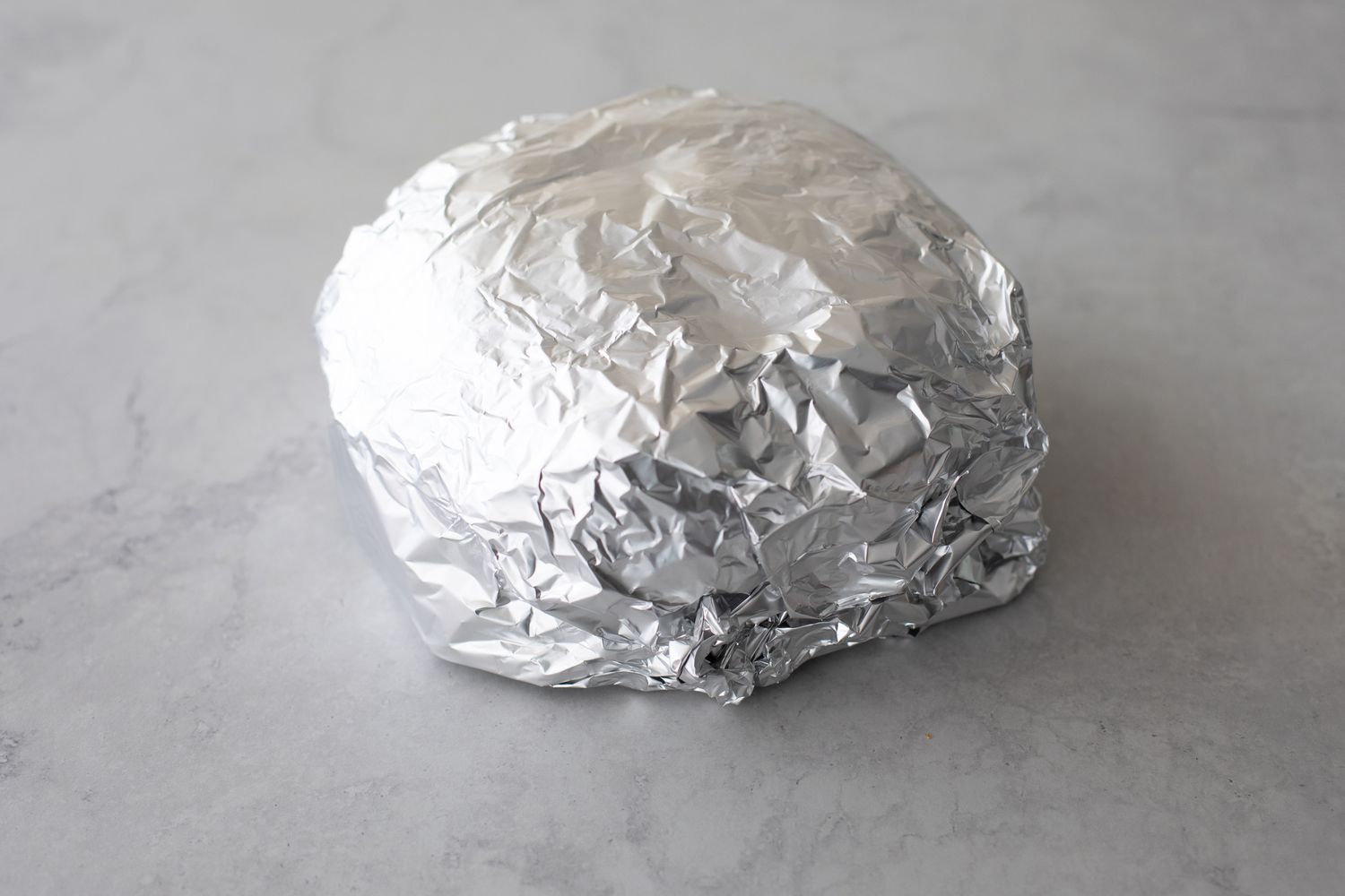 Muffuletta Wrapped in Aluminum Foil 