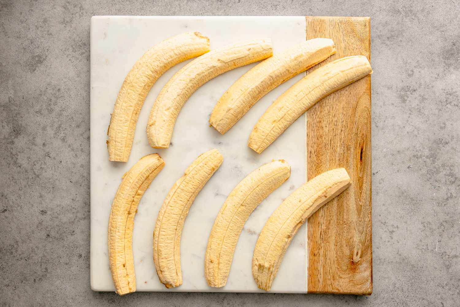 Halved Plantains for Jibarito Sandwich on a Cutting Board