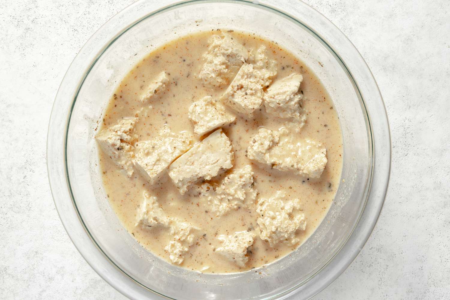 Tofu Nuggets Marinating in Bowl of 