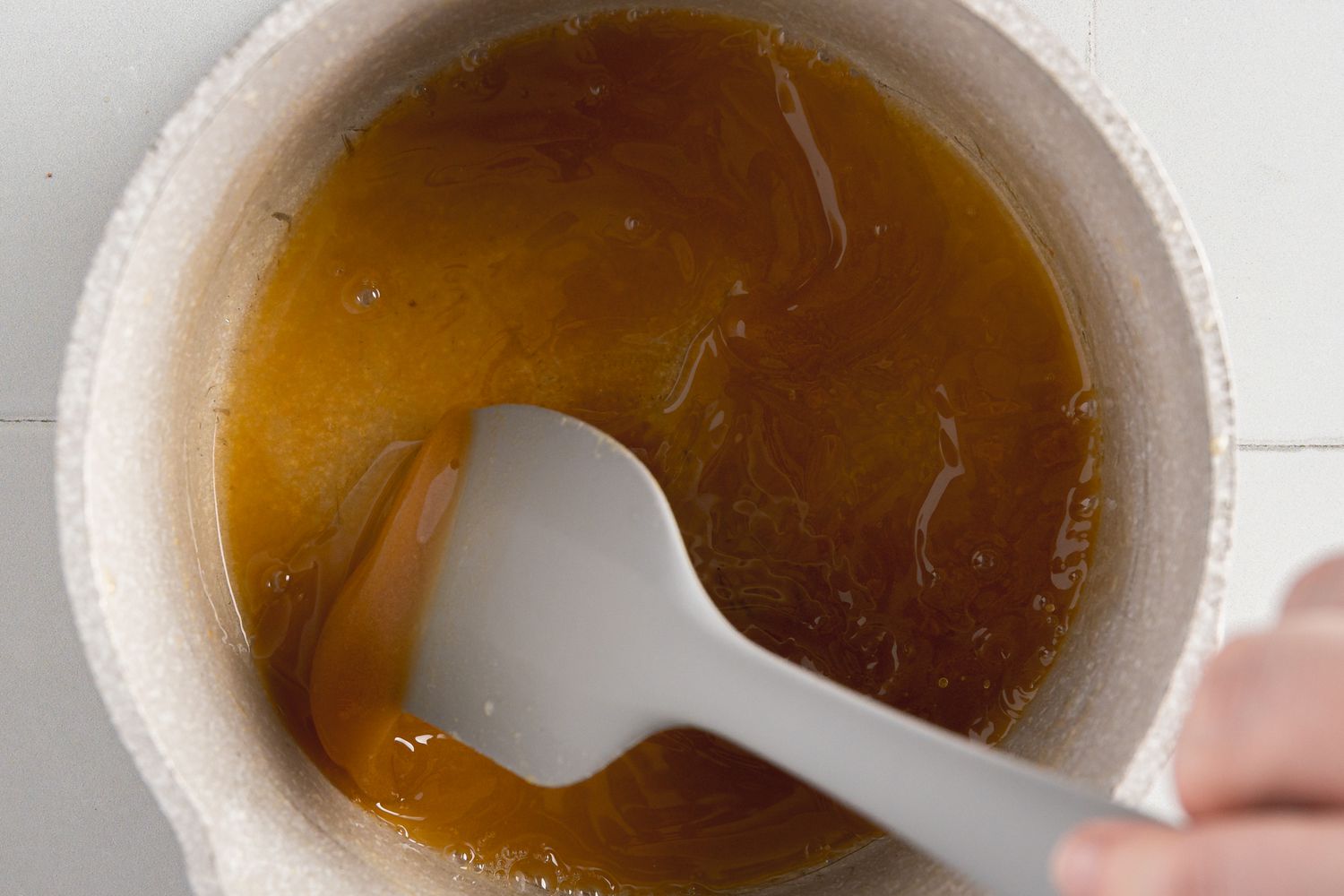 Brown Butter Dressing Stirred Together Using a Spatula in a Sauce Pan