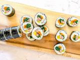 Classic Kimbap on a Wooden Plaque