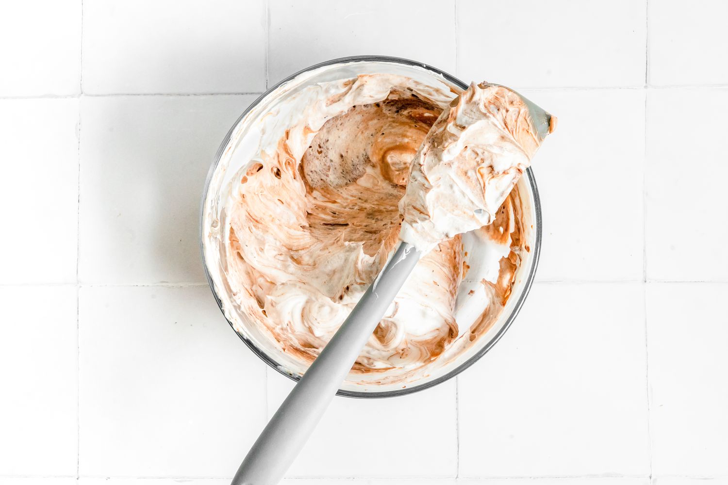 Bowl of Chocolate Pudding Mix and Cool Whip for Dirt Cake 