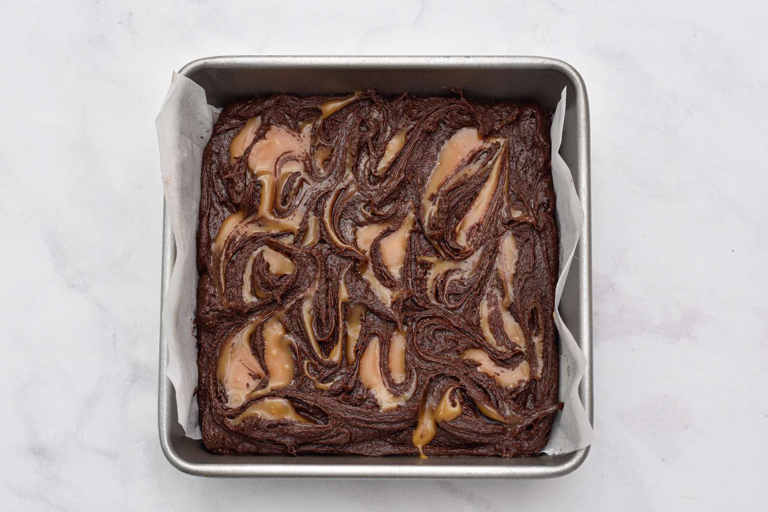 Fudgy Caramel Swirl Brownies in a pan