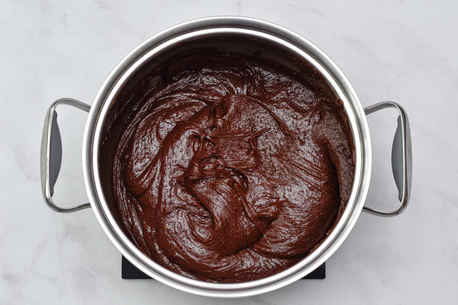 Thick brownie batter to make Fudgy Caramel Swirl Brownies 