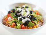 Completed 7 Layer Dip Recipe in Large White Bowl