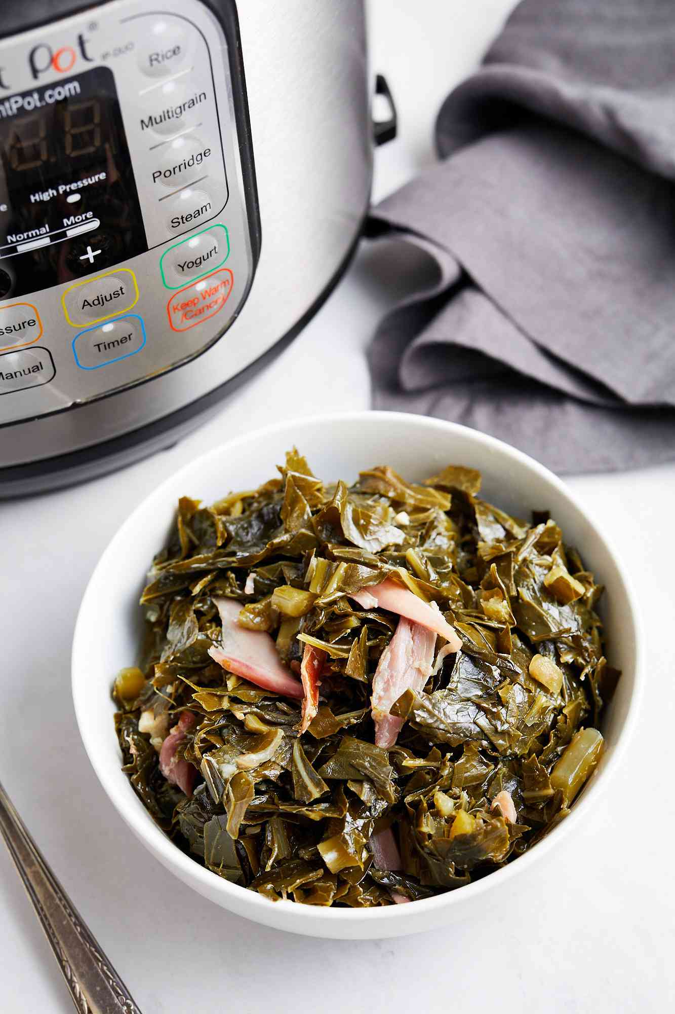 Bowl of Collard Greens Next to an Instant Pot 